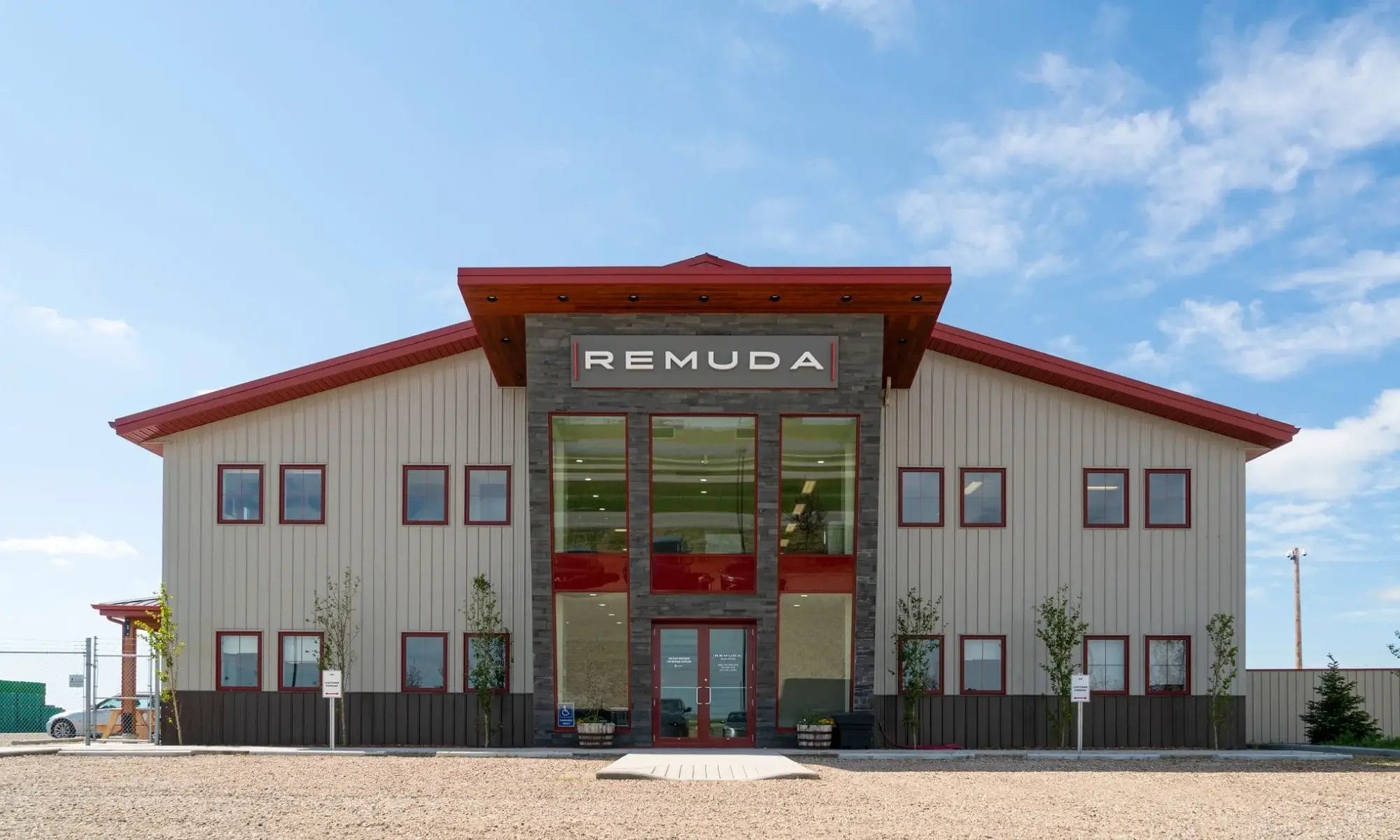 Custom-built commercial office exterior with metal siding and modern architectural details.