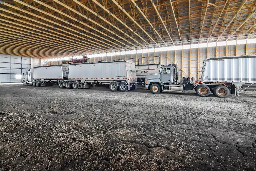 Interior of an 80' x 200' machine shed building with wall light panels