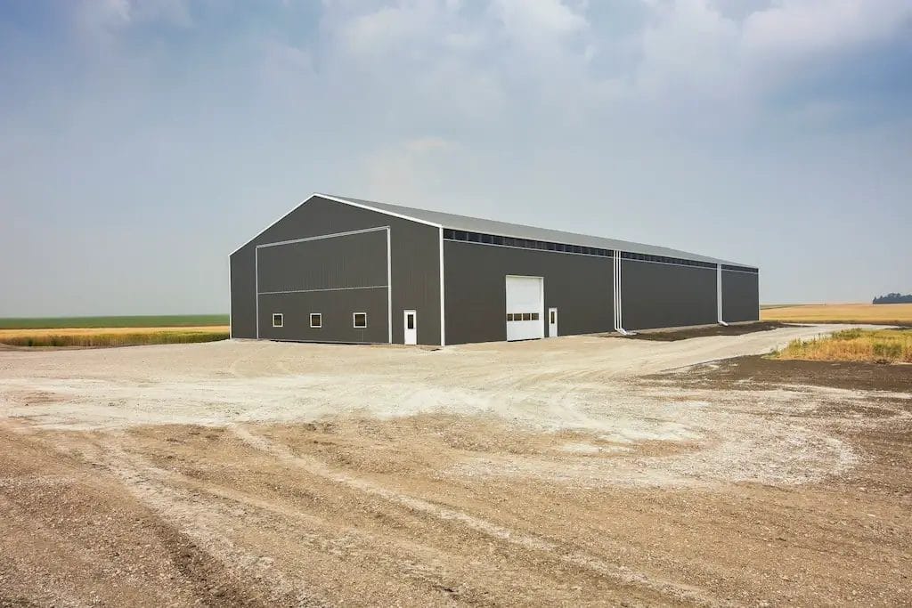 Durable post frame building serves as a cold storage building for farm equipment in Saskatchewan