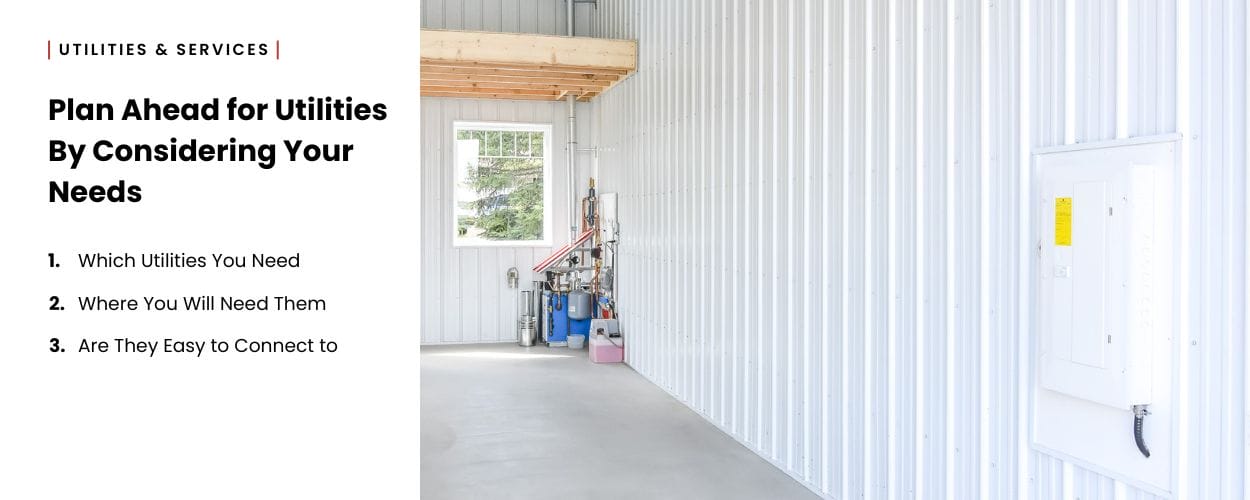 Interior utility area of a post frame building with panel box and water system installations.