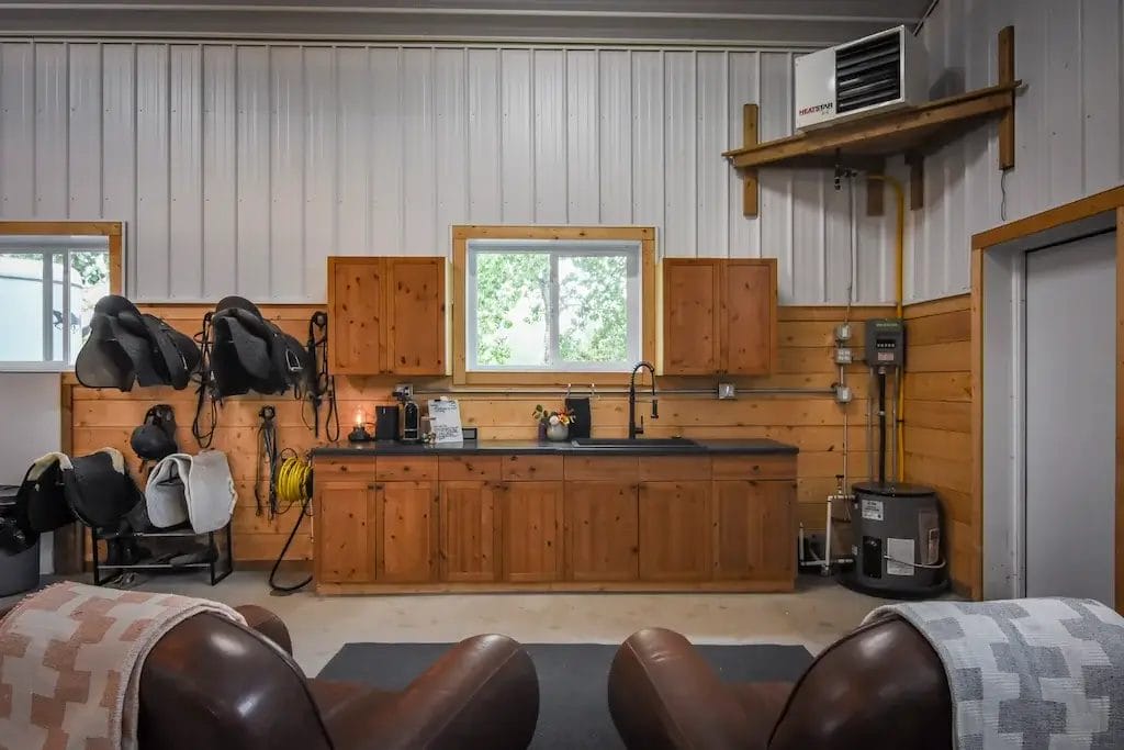 Sink and tack storage inside a horse barn