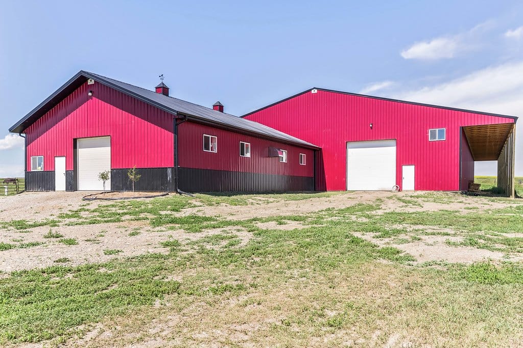 Horse barn attached to a riding arena