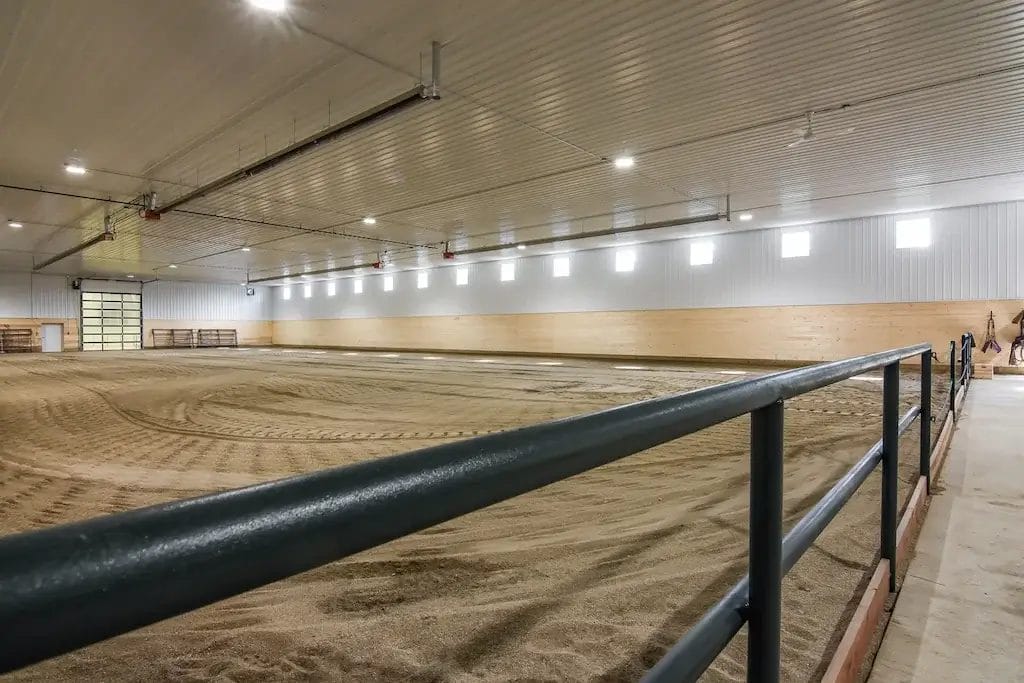 Heated, insulated post frame riding arena interior