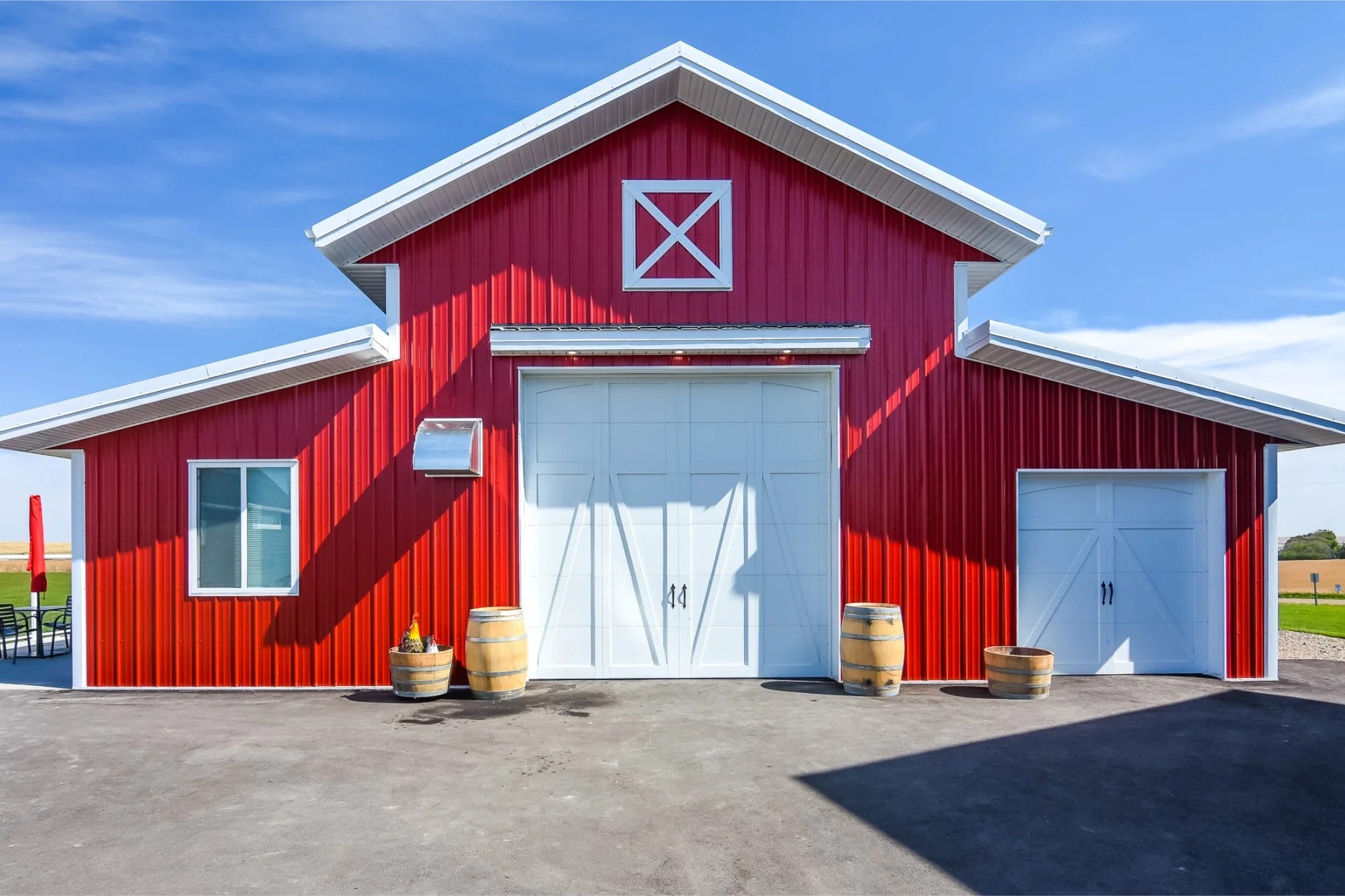 A red monitor hobby shop with elevated details for an upscale rural property.