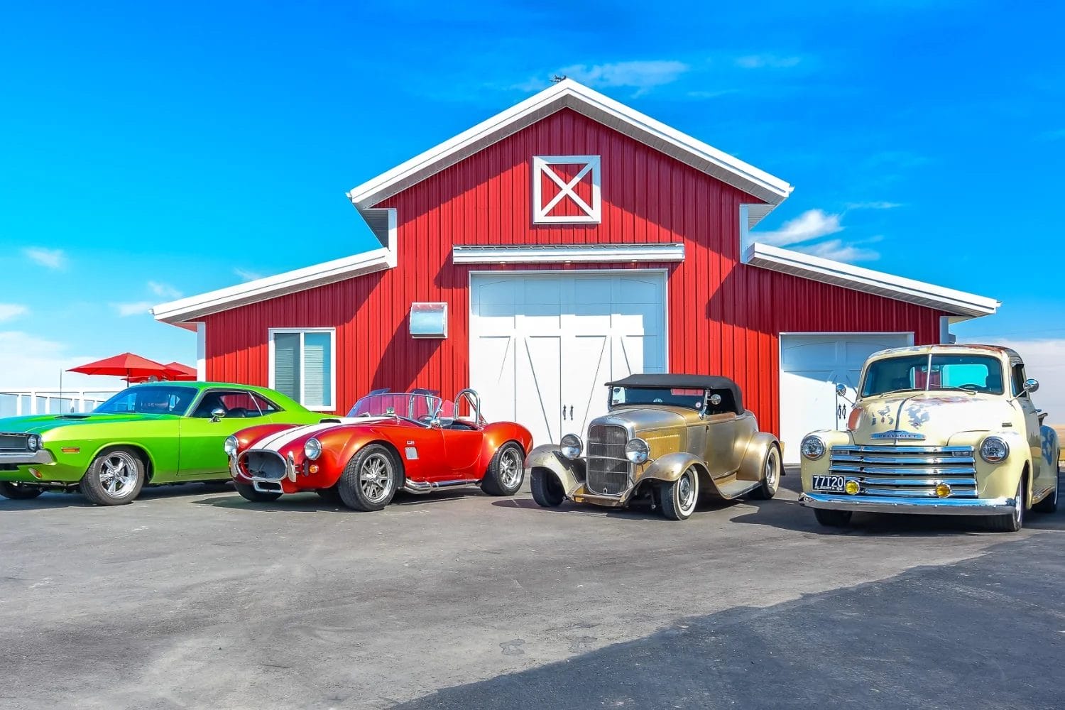 An acreage owner uses this post frame custom hobby shop to show case and store a collection of classic cars.