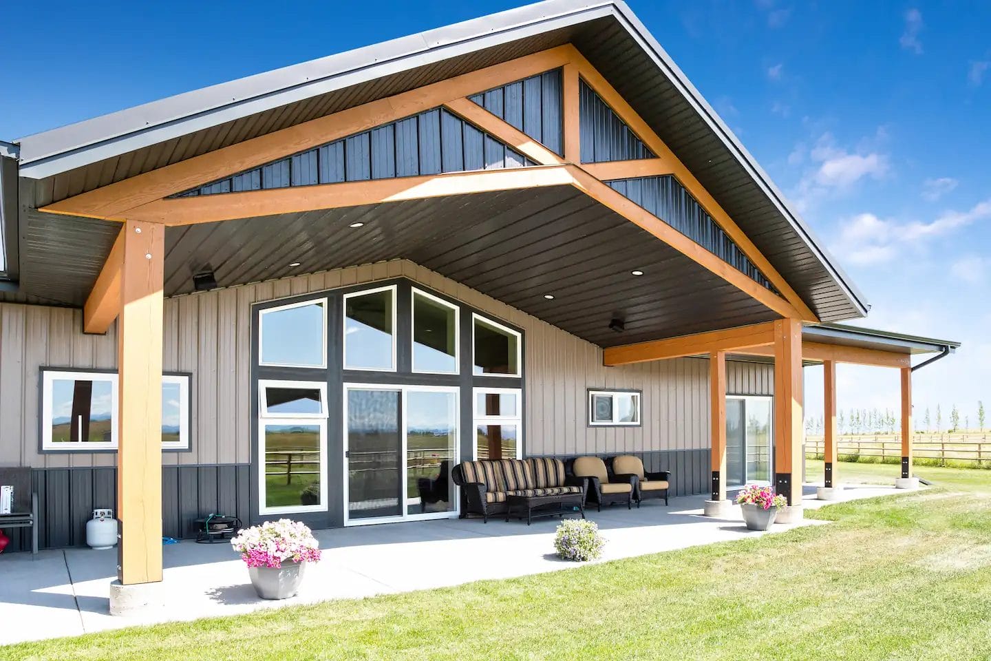 Covered patio space on an 1800 square foot post frame barndominium in Western Canada