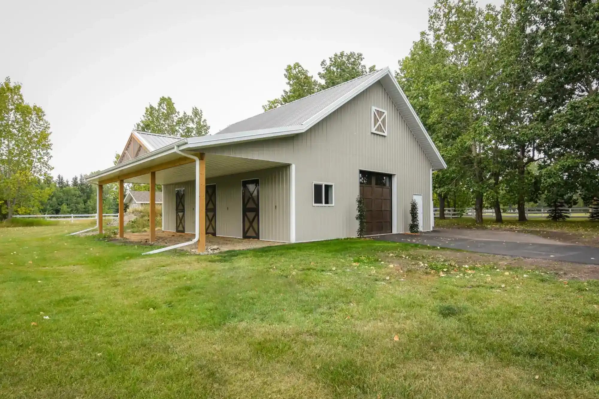 Pole Barn Building For Horses With Stables Inside And Dutch Doors