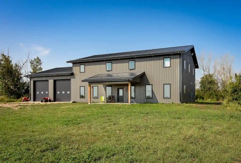 Charcoal and black post frame shop home in the country